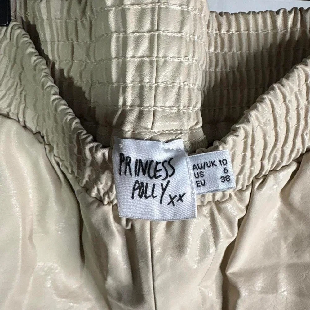 Princess Polly Cream Pleather shorts